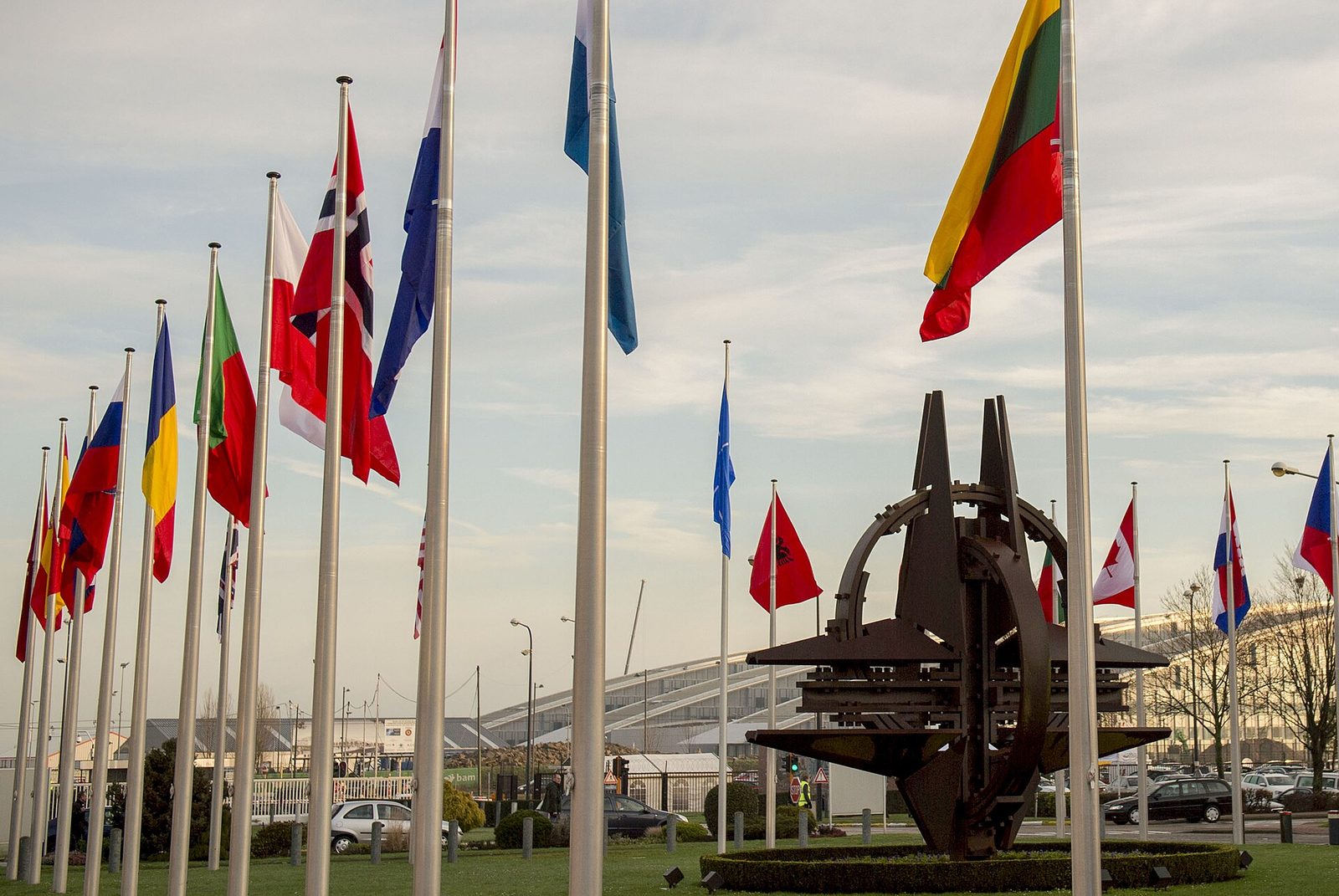 Member-country flags at the entrance of NATO headquarters in Brussels